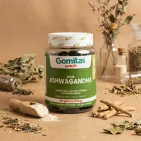 Gomitas de ashwagandha y NAD con sus ingredientes naturales alrededor