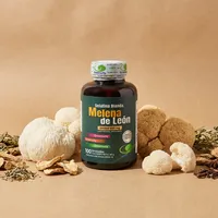 Melena de león en cápsulas con sus ingredientes naturales alrededor