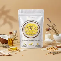 Vitamina D3 y K2 en cápsulas con sus ingredientes naturales alrededor